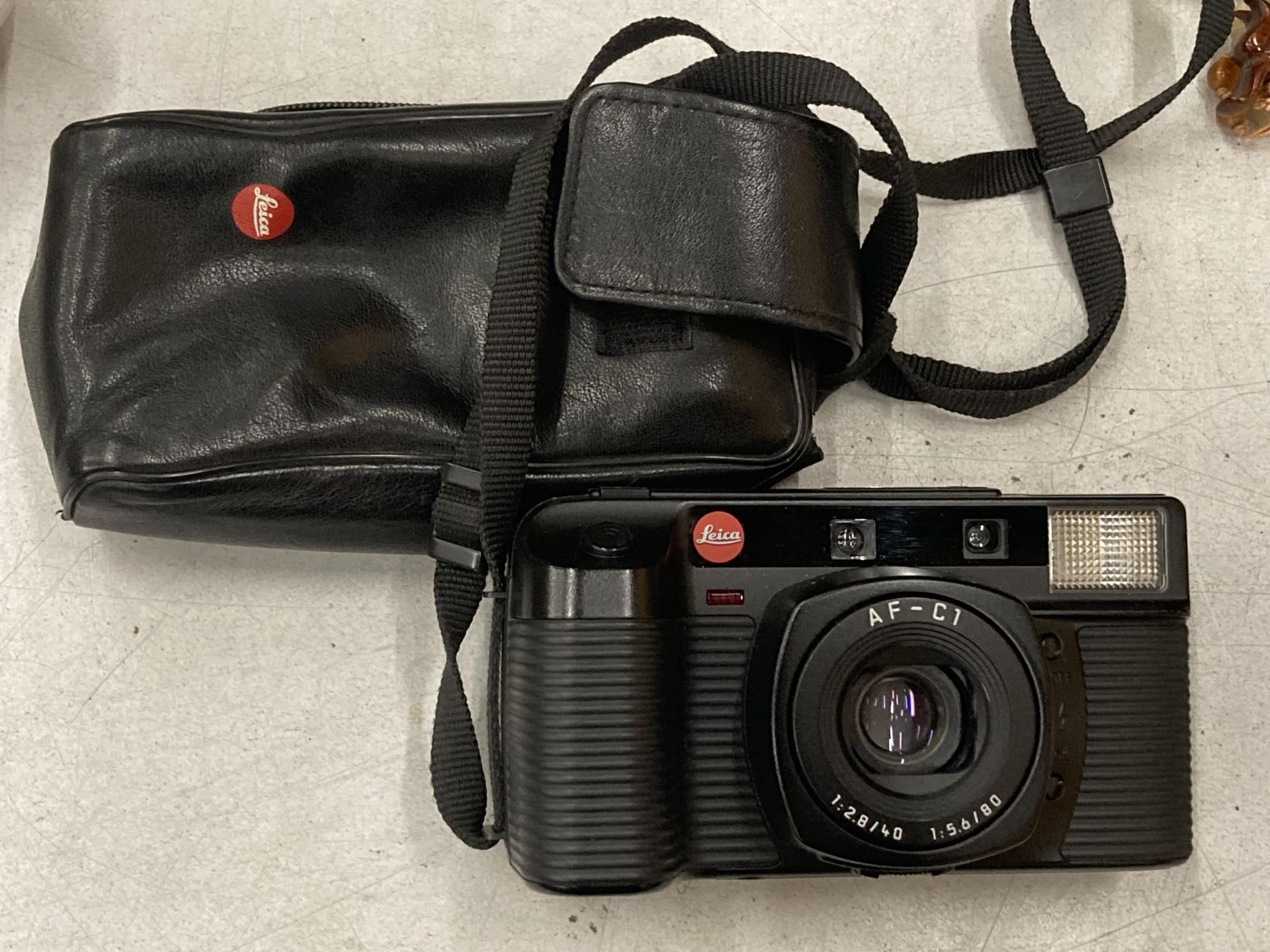 A LEICA AF-C1 WITH CASE