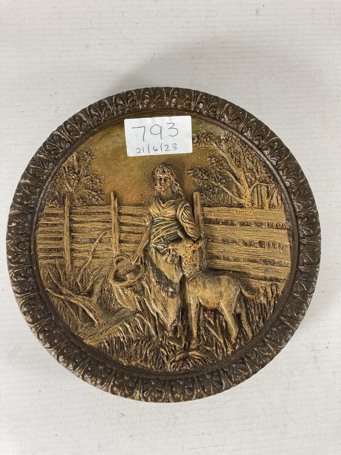 AN CIRCA 1893 STONEWARE PLATE WITH AN IMAGE OF A GOATHERDER AND GOAT DIAMETER 17CM
