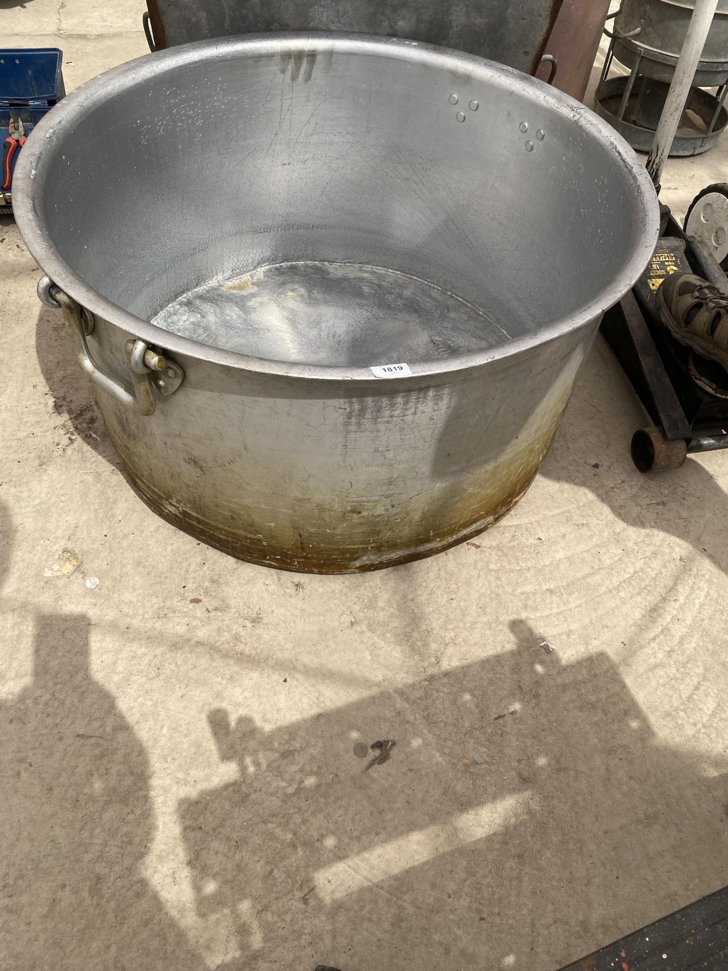 A VERY LARGE STAINLESS STEEL COOKING POT