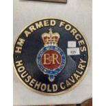 A CAST ARMED FORCES SIGN