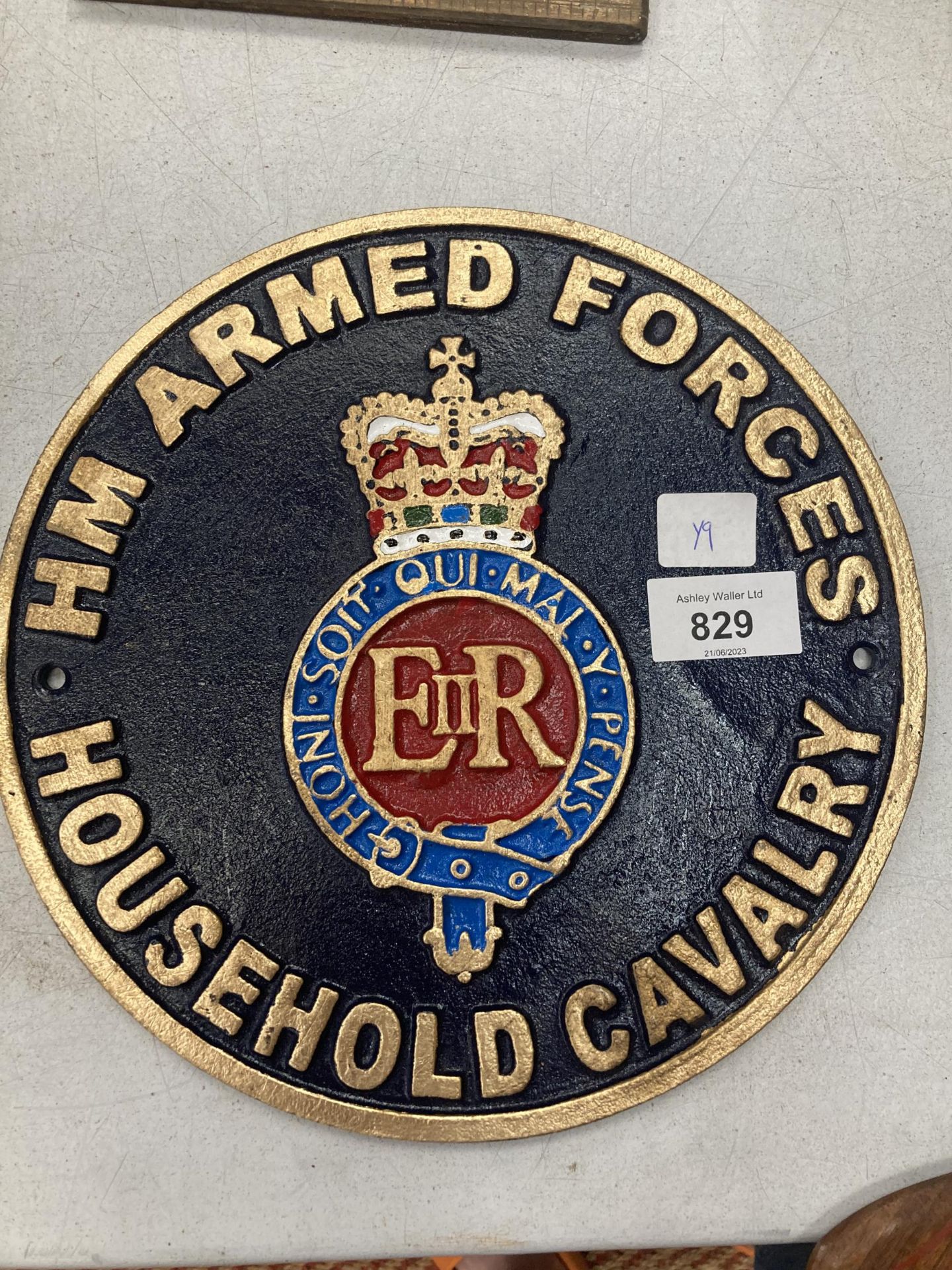 A CAST ARMED FORCES SIGN