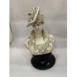A BUST OF A LADY ON A PLINTH HEIGHT 39CM