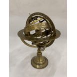 A BRASS ARMILLARY GLOBE HEIGHT 26CM