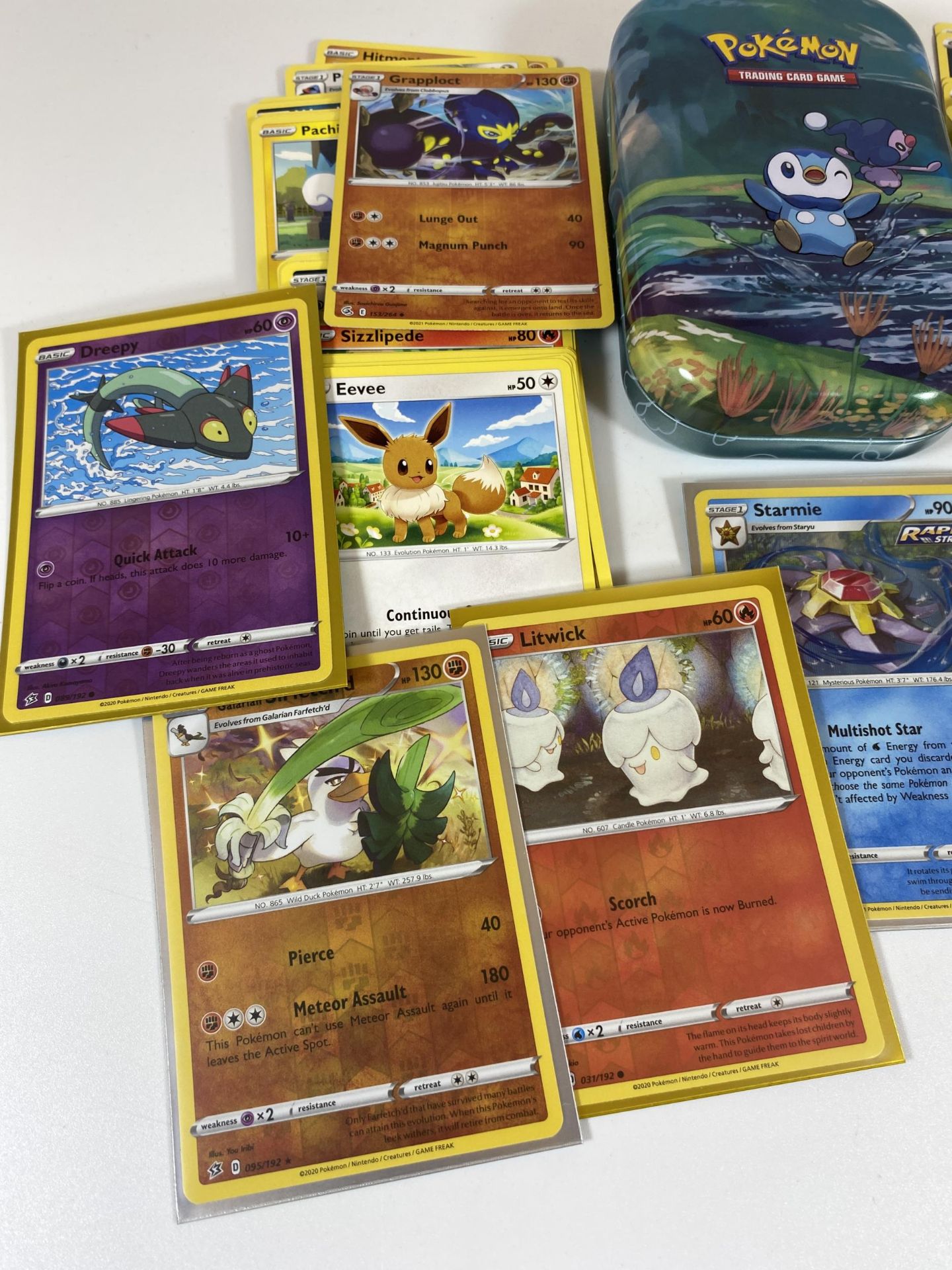 A TIN OF ASSORTED POKEMON CARDS, HOLOS ETC - Image 2 of 3