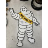 A CAST MICHELIN MAN SIGN