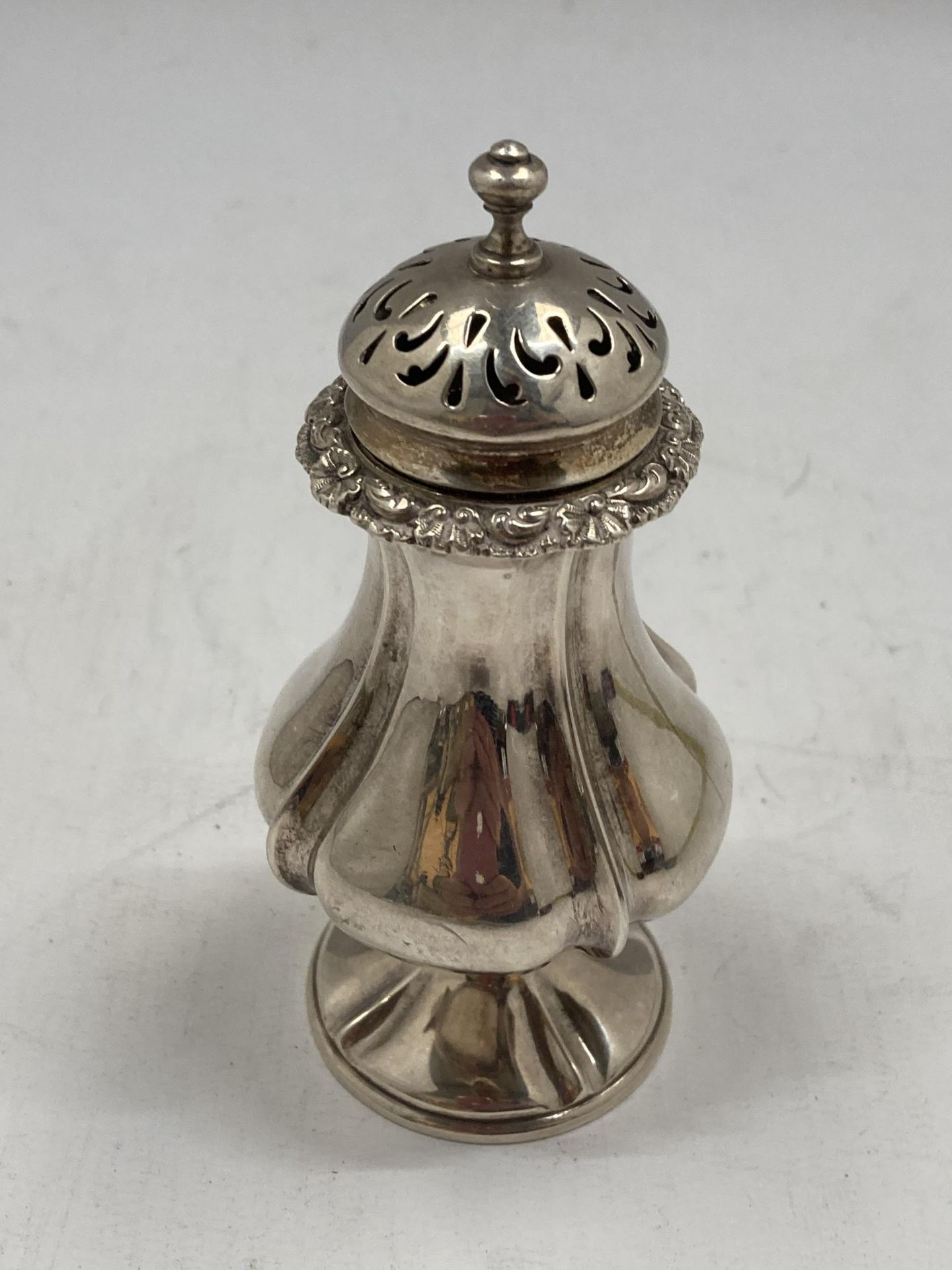 A VICTORIAN HALLMARKED SILVER SUGAR SIFTER