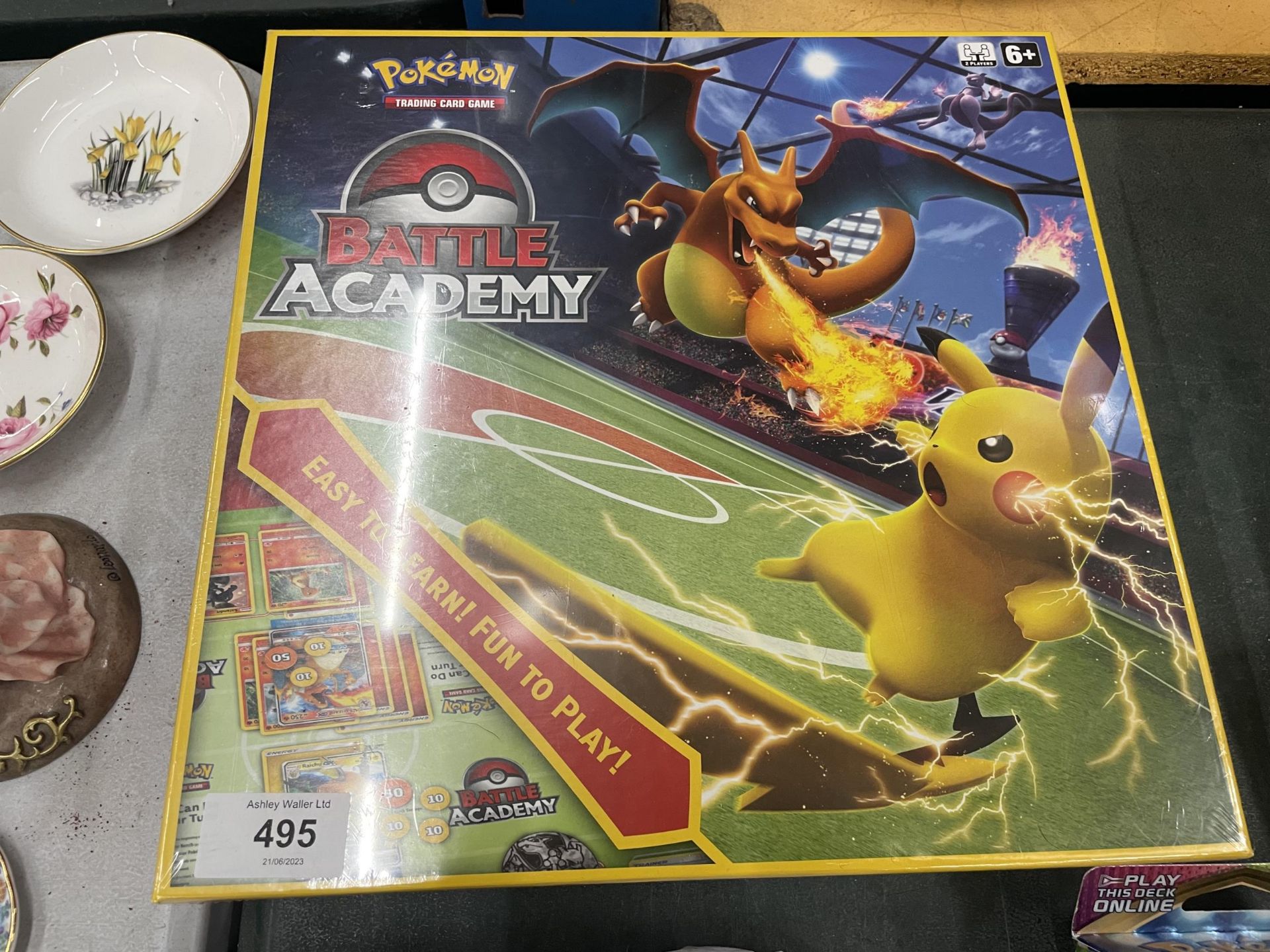 A NEW AND SEALED POKEMON BATTLE ACADEMY BOARD GAME WITH A DREDNAW AND CHARIZARD BATTLE DECKS