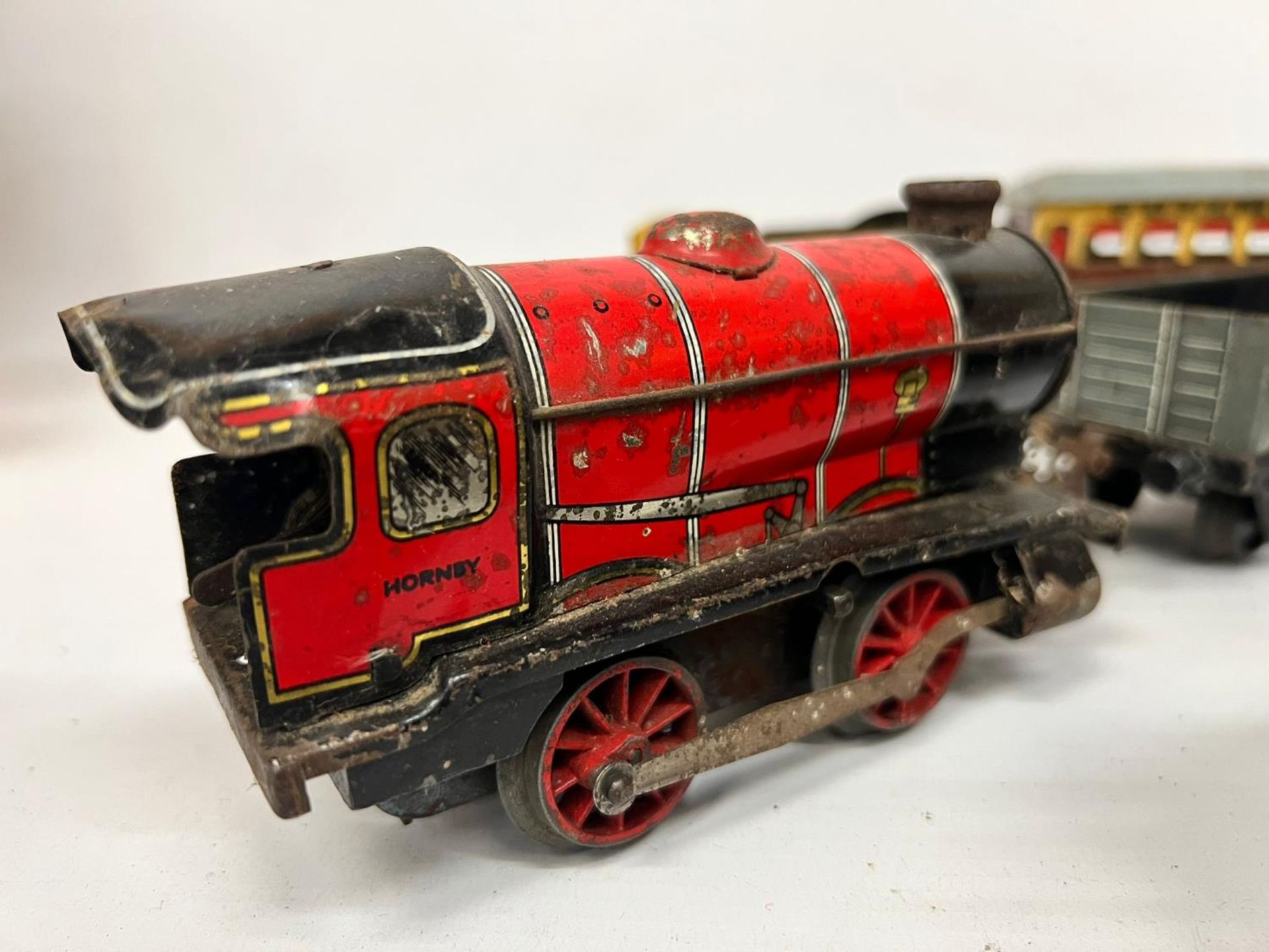 EIGHT O GAUGE MODEL RAILWAY ROLLING STOCK - FOUR CLOCKWORK LOCOMOTIVES, TWO PULLMAN CARRIAGES AND - Image 2 of 5