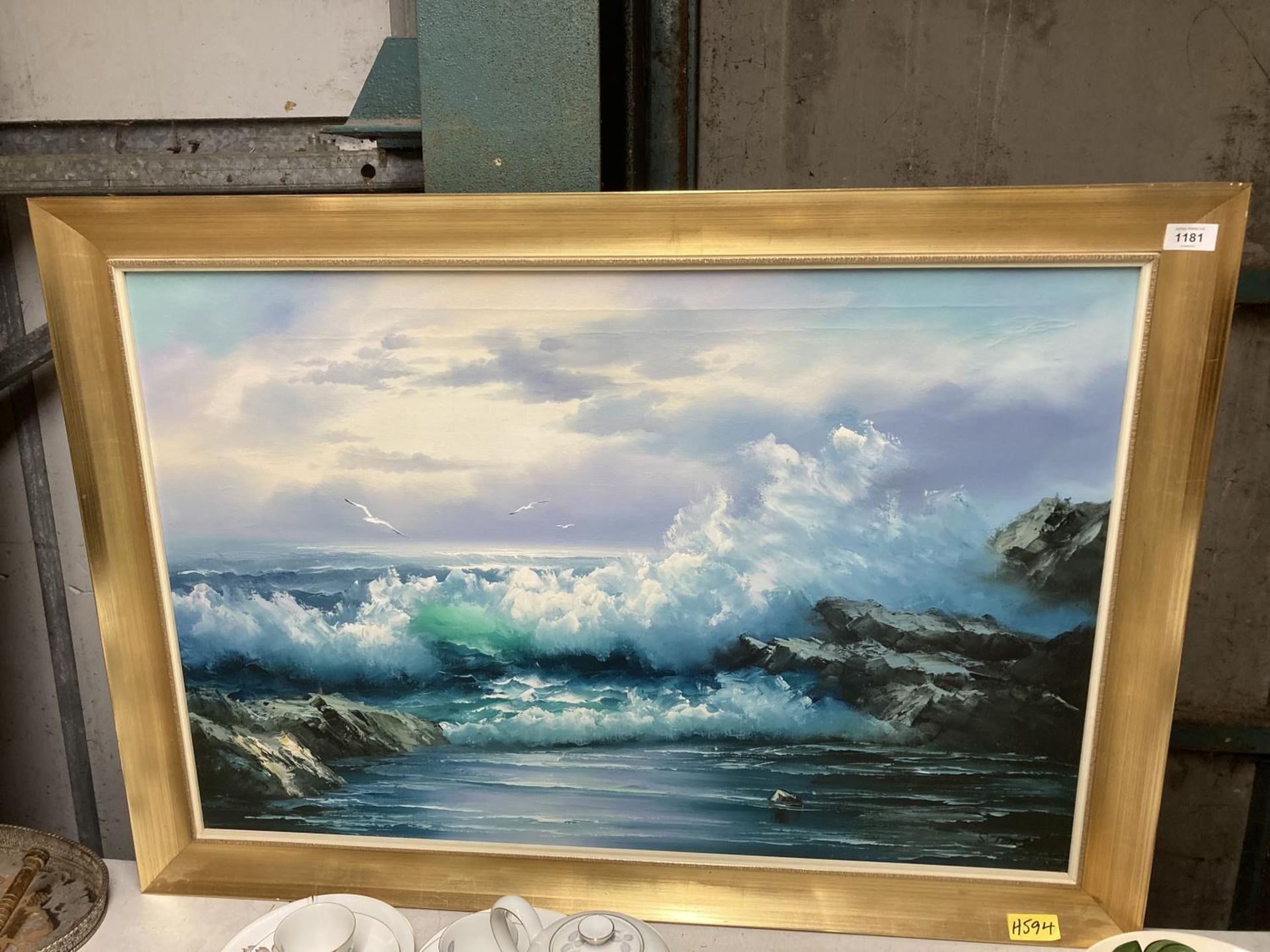 A MODERN GILT FRAMED OIL PAINTING OF CRASHING WAVES, SIGNED S.TODD