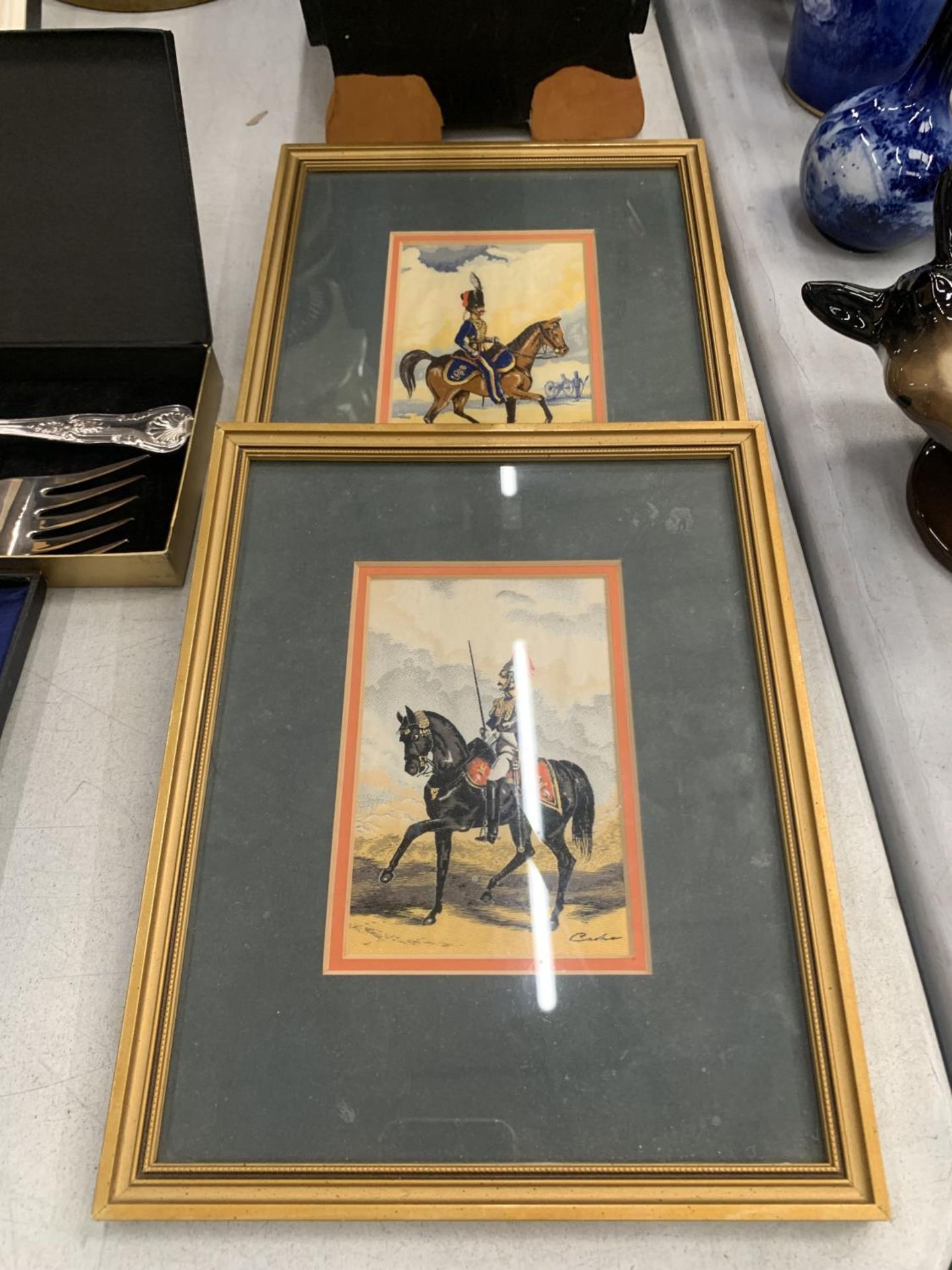 TWO FRAMED CASH'S SILKS OF MILITARY FIGURES ON HORSEBACK