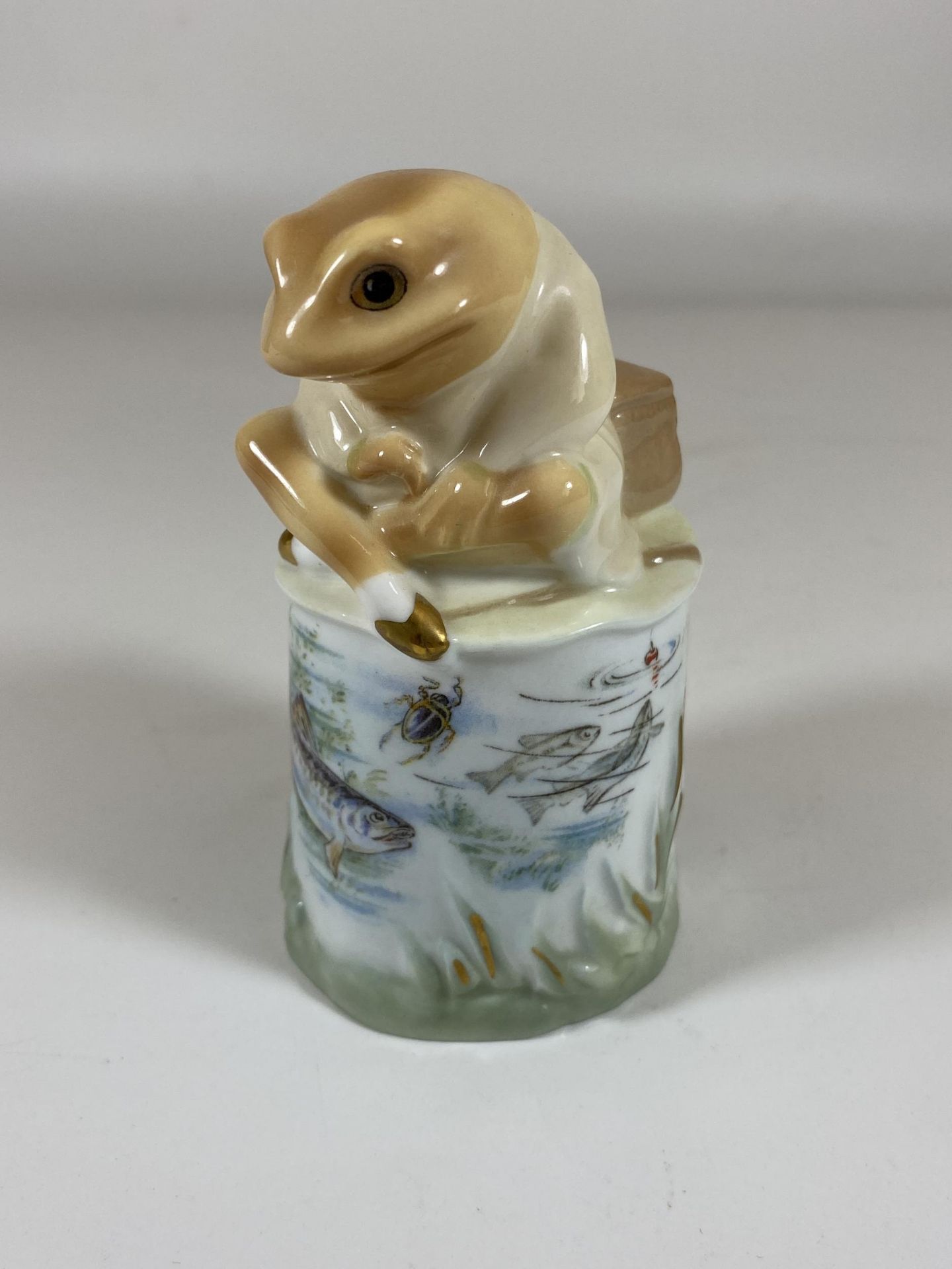 A LIMITED EDITION ROYAL WORCESTER MR JEREMY FISHER BEATRIX POTTER CANDLE SNUFFER, HEIGHT 11CM