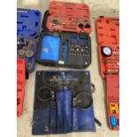 AN ASSORTMENT OF TOOLS TO INCLUDE A TIMING GEAR REPAIR KIT ETC