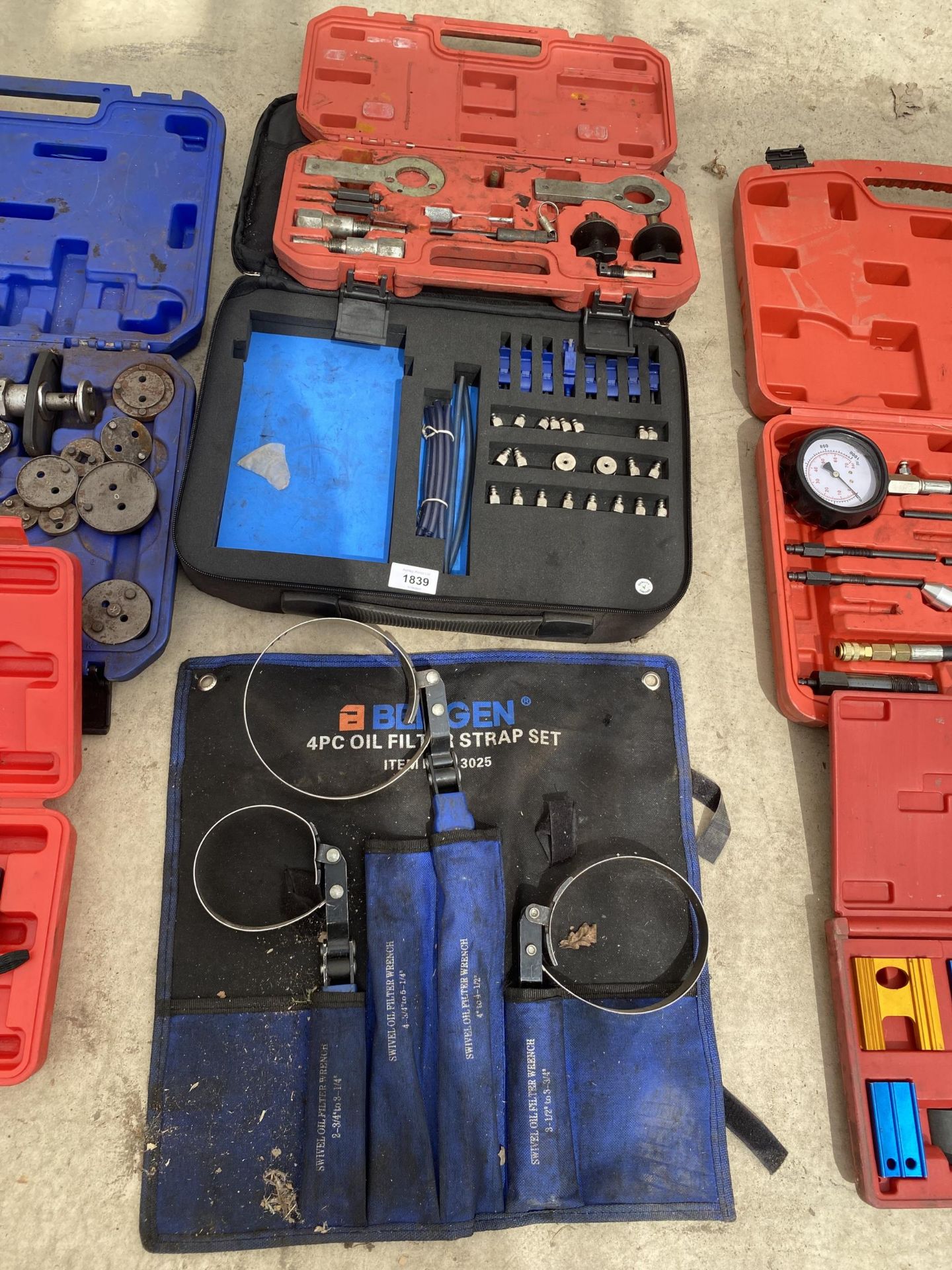 AN ASSORTMENT OF TOOLS TO INCLUDE A TIMING GEAR REPAIR KIT ETC