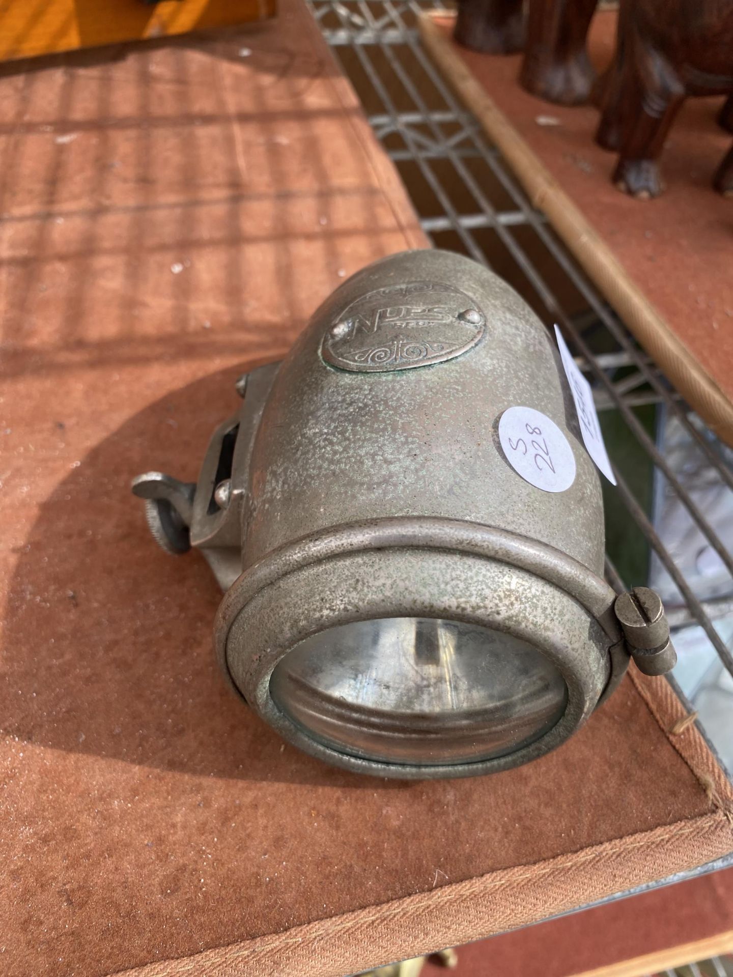 A VINTAGE NUPS REG BULLET AUTOMOBILE LIGHT