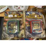 TWO AMSUA HAND HELD BATTERY GAMES