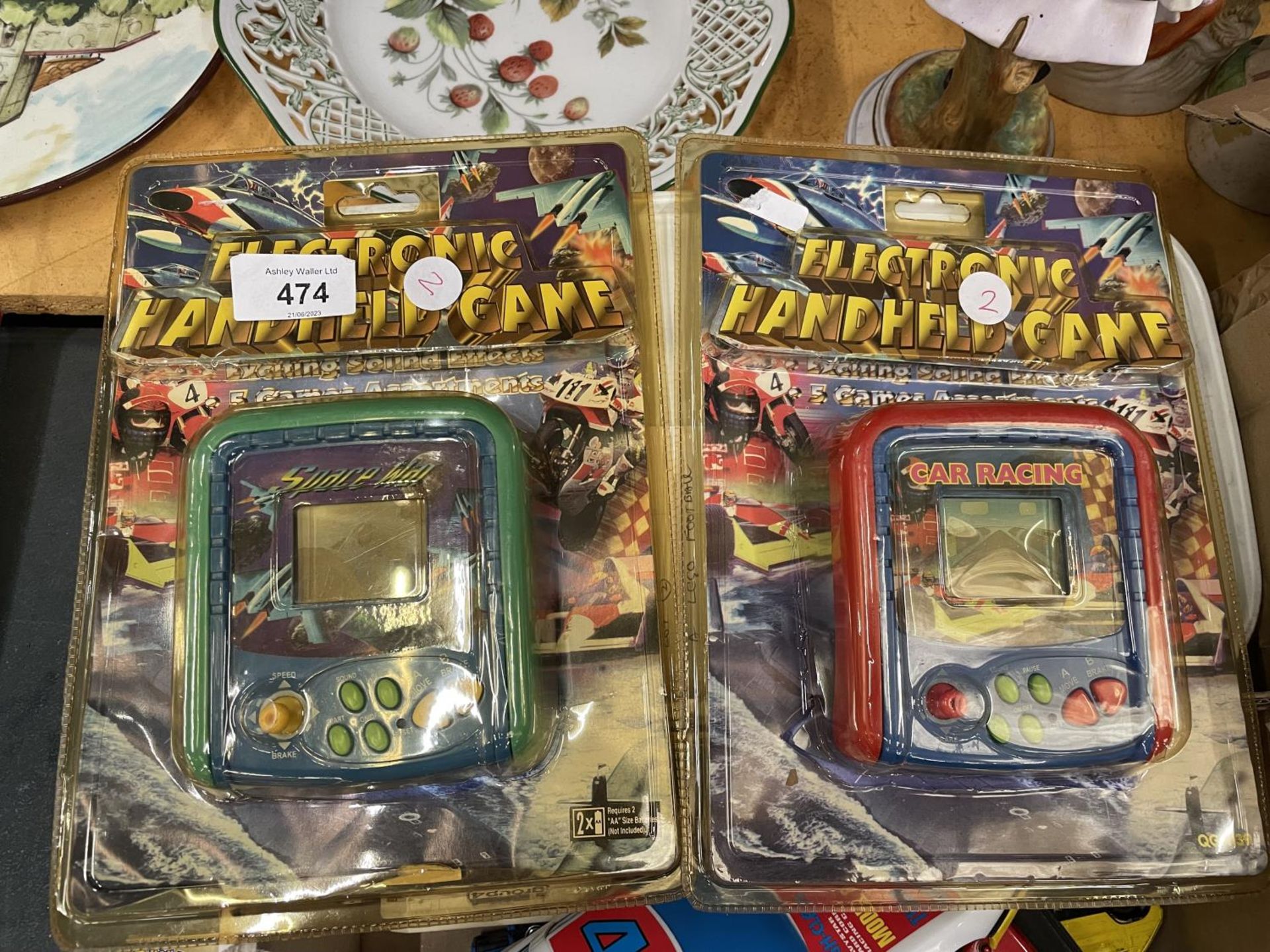 TWO AMSUA HAND HELD BATTERY GAMES