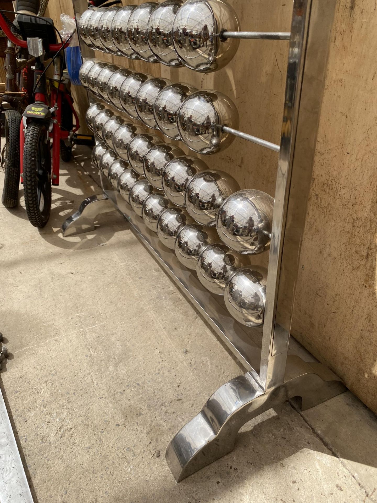 A LARGE STAINLESS STEEL ABACUS BY SAM AND SARA - Bild 2 aus 5