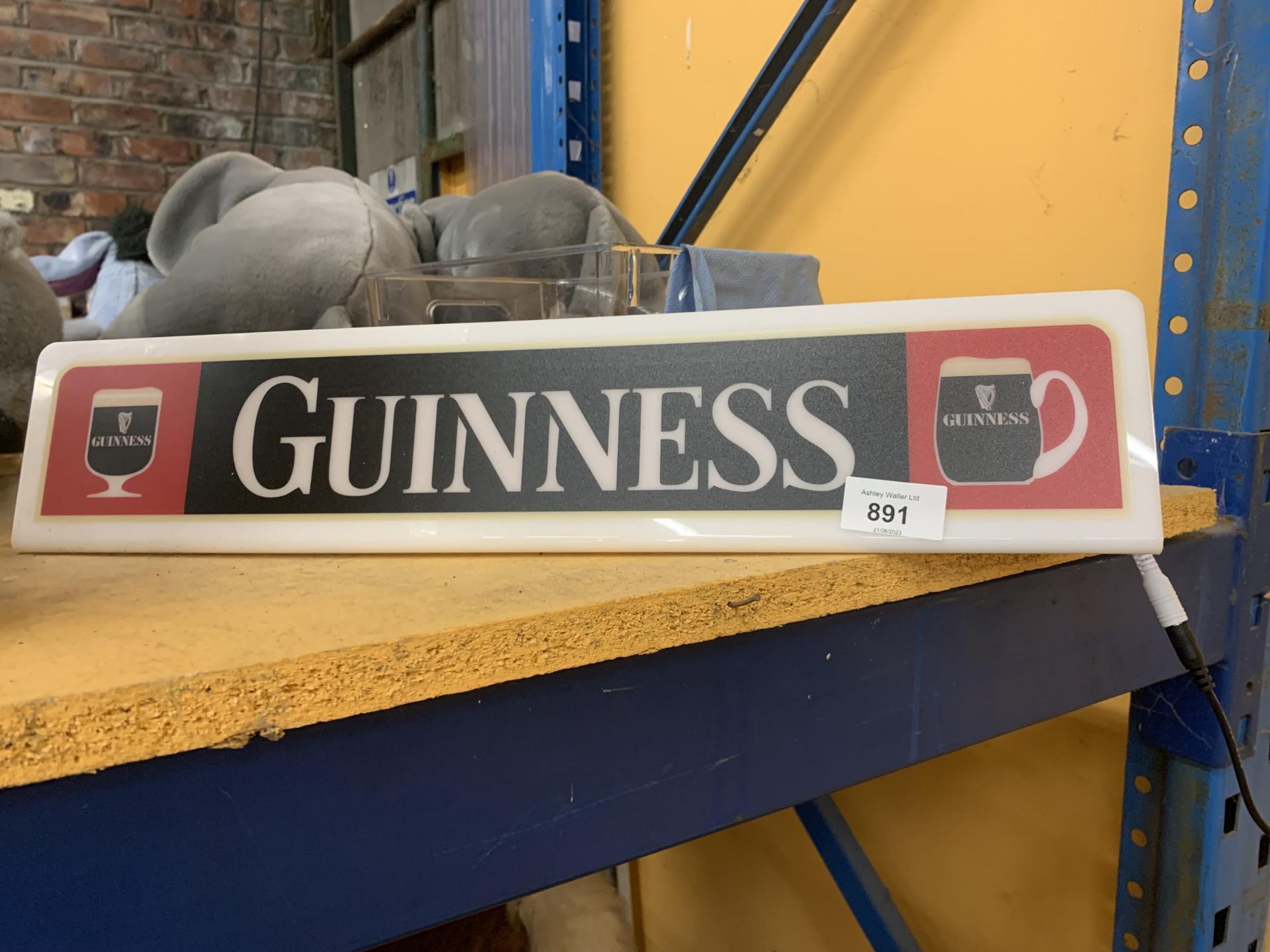 AN ILLUMINATED 'GUINNESS' BAR SIGN - WORKING AT TIME OF CATALOGUING