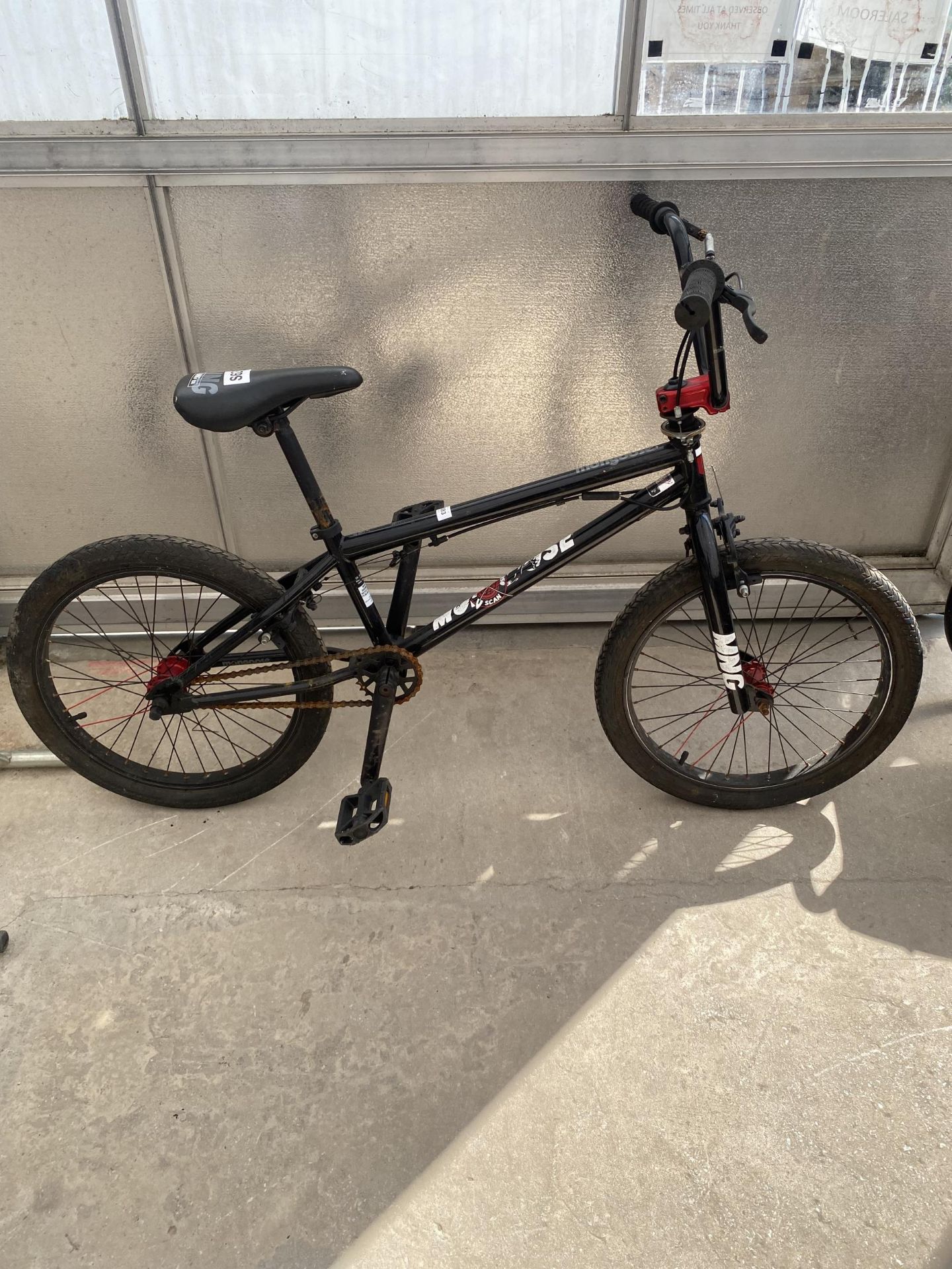 A MONGOOSE BMX STYLE BIKE