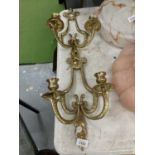 A PAIR OF GILT WALL HANGING CANDLE HOLDERS