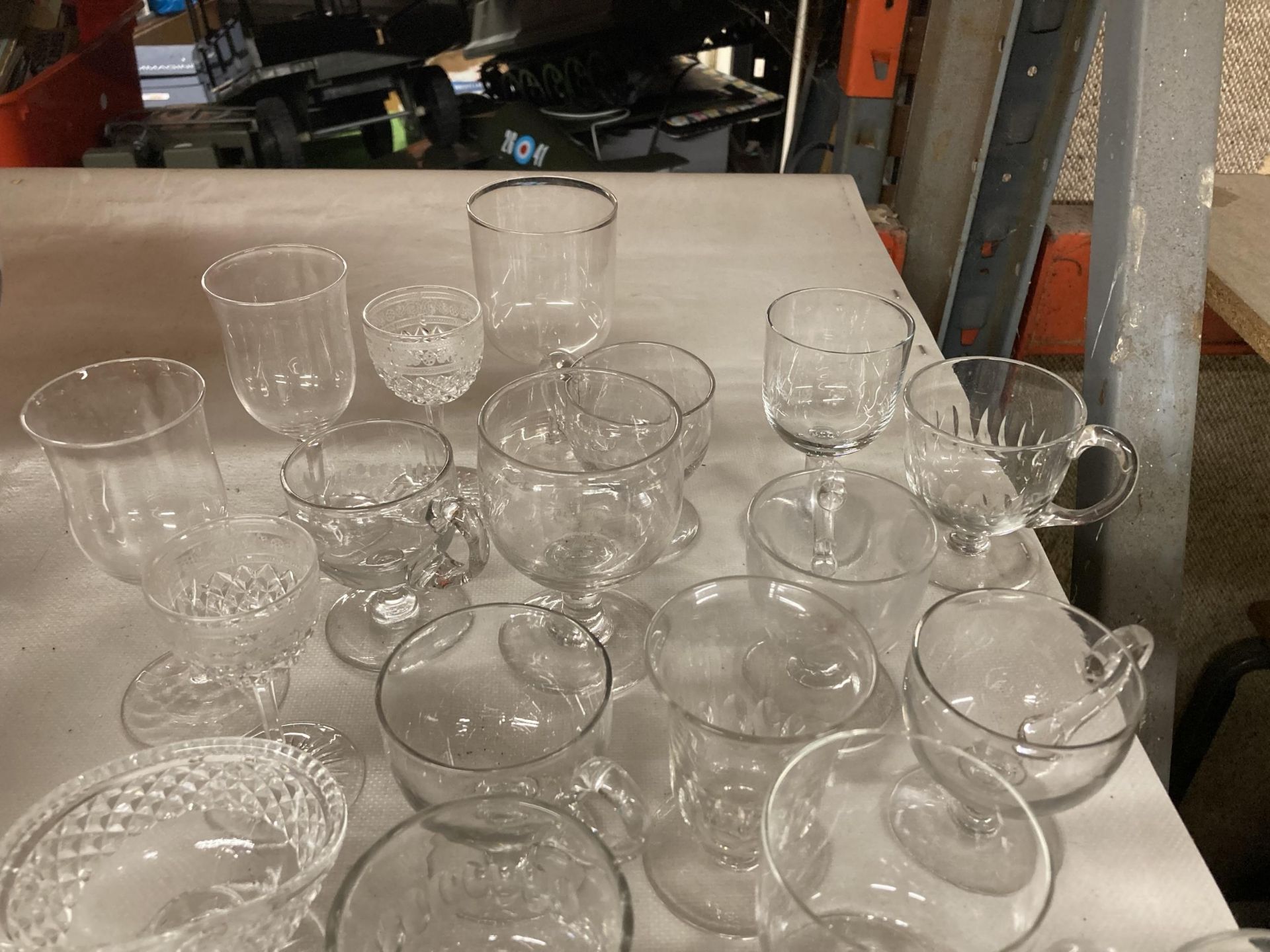 A QUANTITY OF GLASSES TO INCLUDE WINE, CUSTARD CUPS, WINE GLASSES, ETC PLUS ASET OF FOUR BLUE TINTED - Image 2 of 3