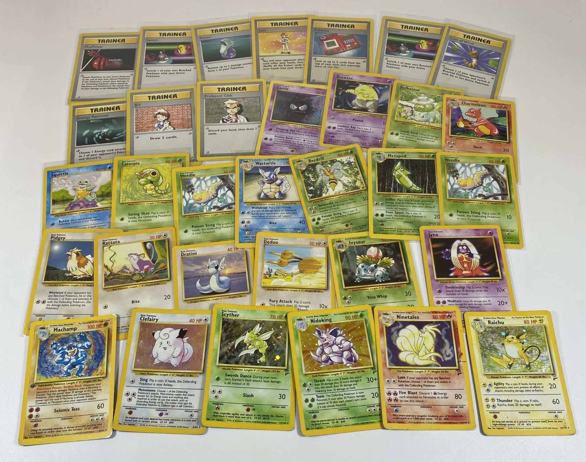 A COLLECTION OF 1999 POKEMON BASE SET CARDS, 1ST EDITION HOLO MACHAMP AND OTHER HOLOS, RAICHU,