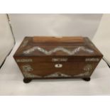 AN ANTIQUE ROSEWOOD AND MOTHER OF PEARL TEA CADDY WITH TWO INNER COMPARTMENTS AND CUT GLASS BOWL