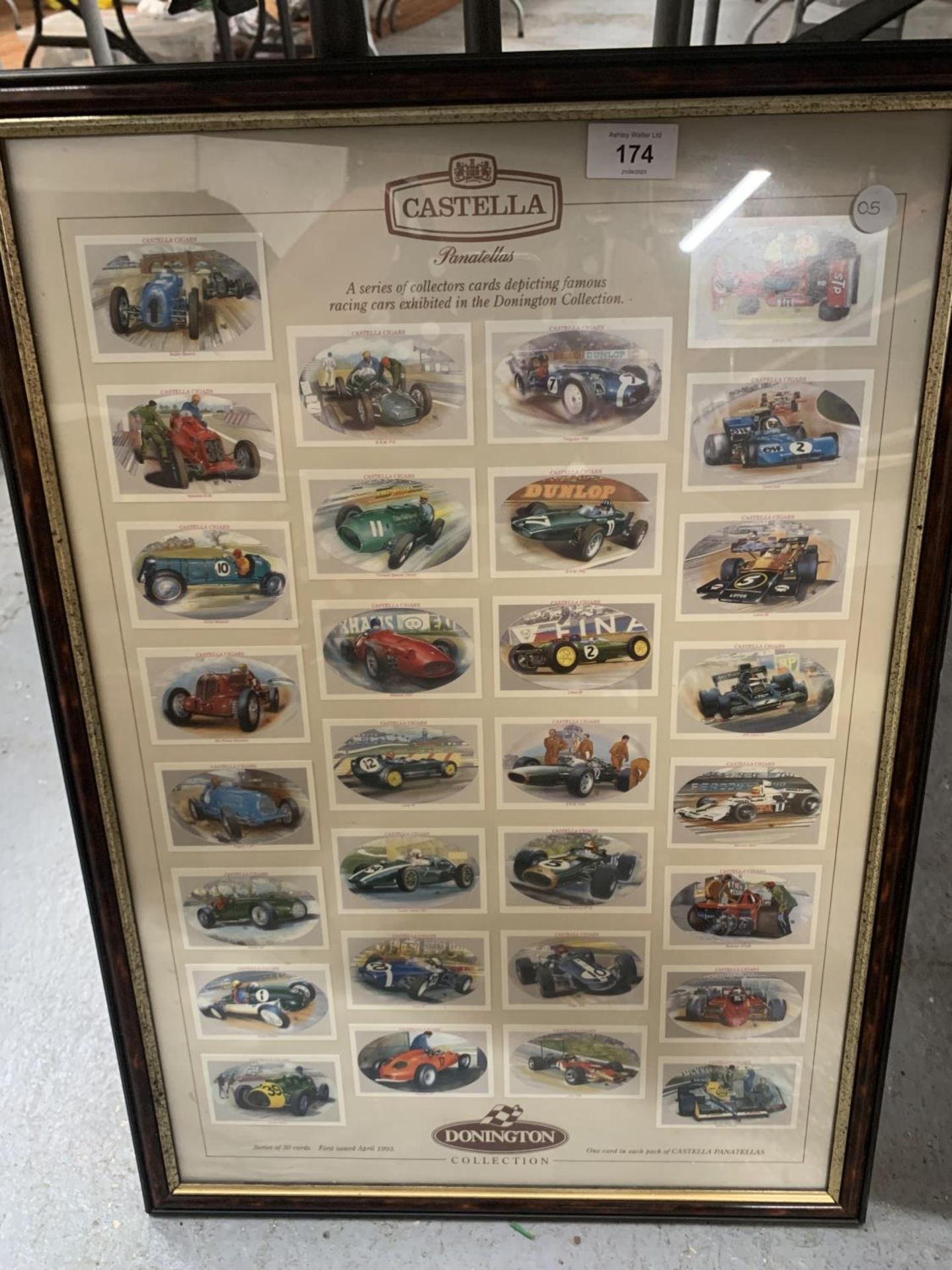 A COLLECTION OF DONNINGTON CASTELLA CIGAR CARDS IN A FRAME