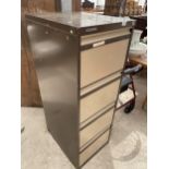 A FOUR DRAWER METAL FILING CABINET