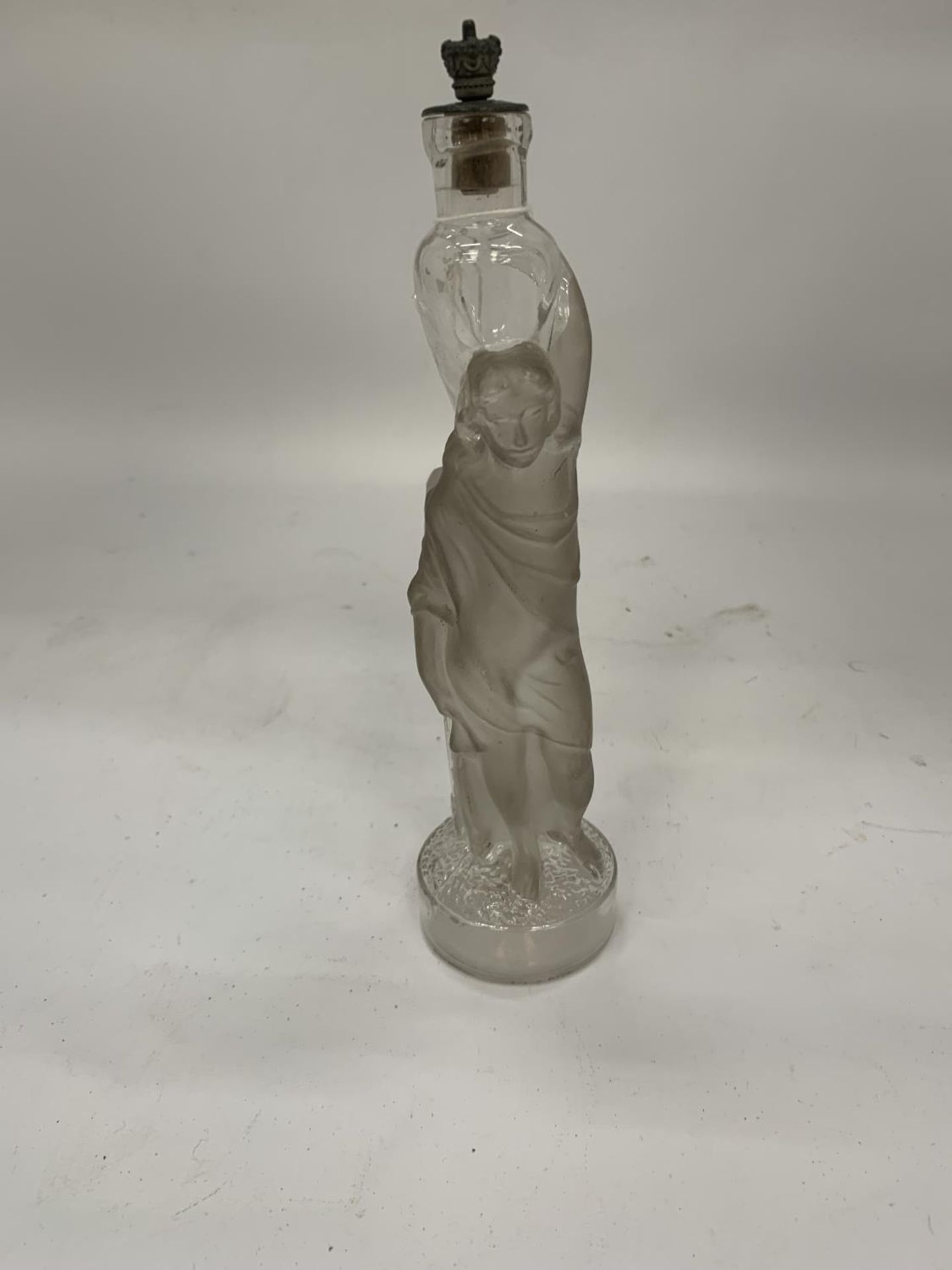 A VINTAGE GLASS LIQUER/SCENT BOTTLE IN THE FORM OF A LADY HEIGHT 21CM