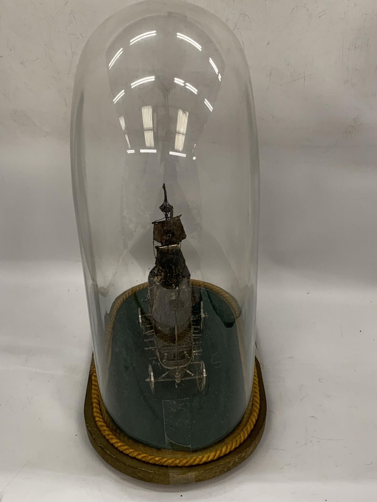 A VINTAGE WHITE METAL, POSSIBLY SILVER, BOAT MODEL IN VINTAGE GLASS DOME CASE, DOME HEIGHT 46CM - Image 3 of 4