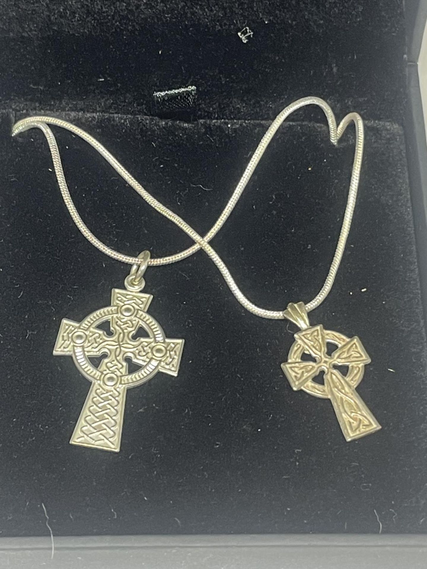 TWO SILVER NECKLACES AND CROSS PENDANTS IN A PRESENTATION BOX
