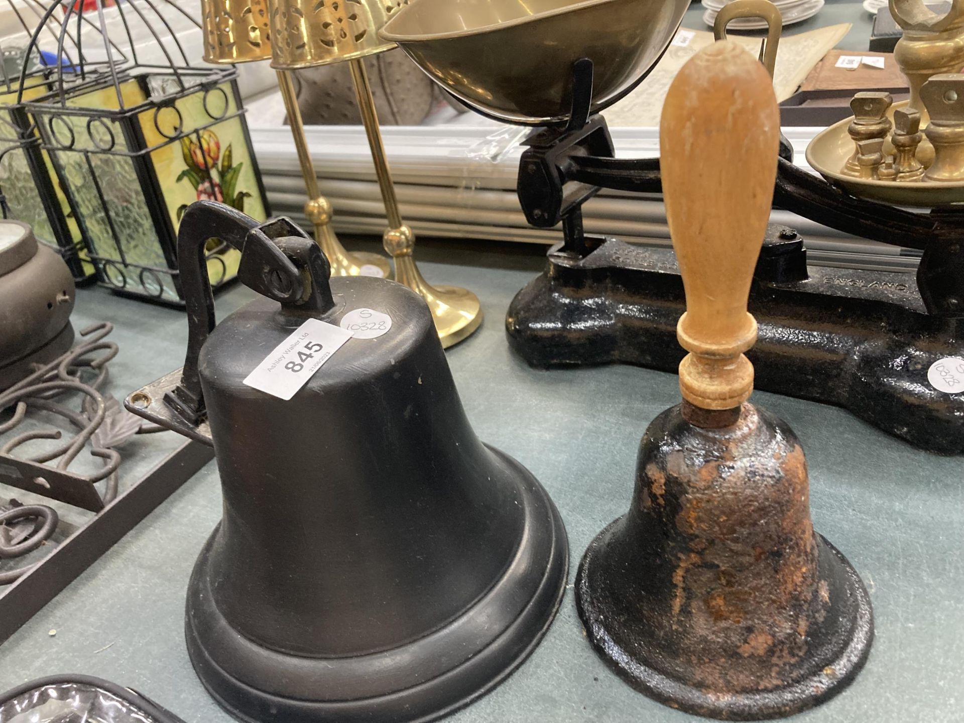 TWO VINTAGE BELLS TO INCLUDE A WOODEN HANDLED EXAMPLE