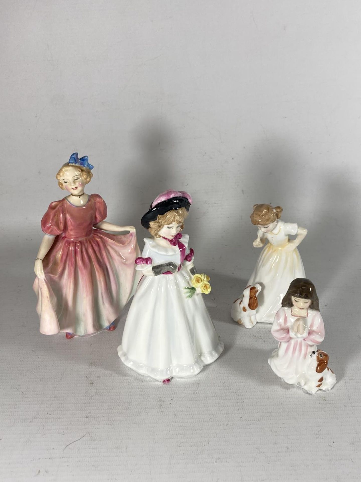 FOUR ROYAL DOULTON FIGURES TO INCLUDE SWEETING, SHARON, INNOCENCE AND SIT