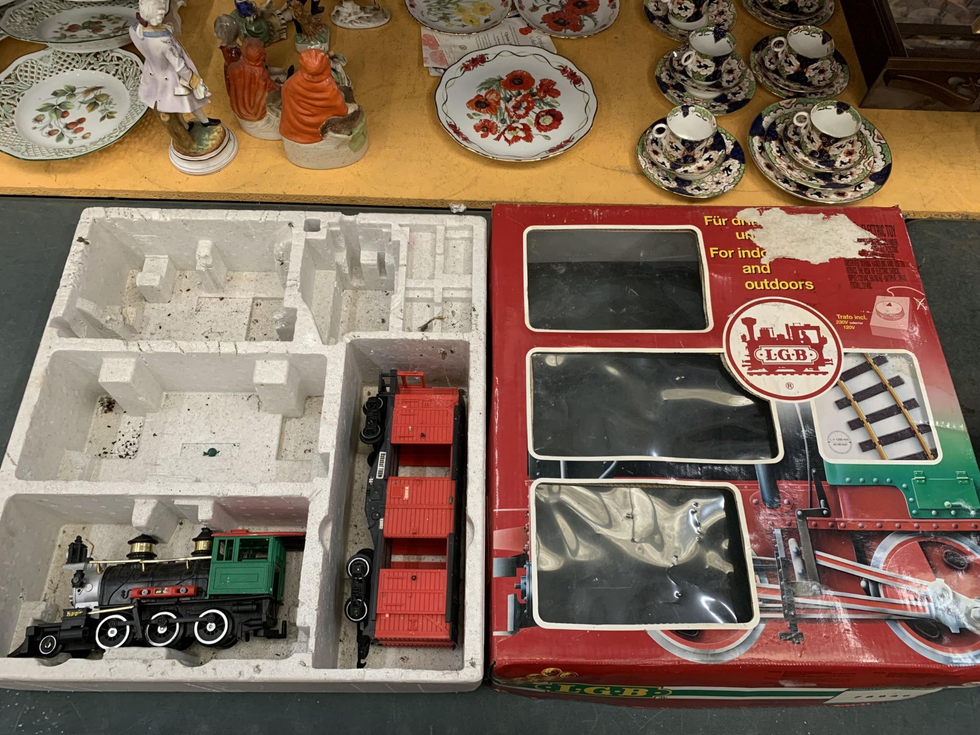 A LEHMAN GROSS BAHN PART TRAIN SET COMPRISING OF A LOCOMOTIVE AND A GOODS WAGON