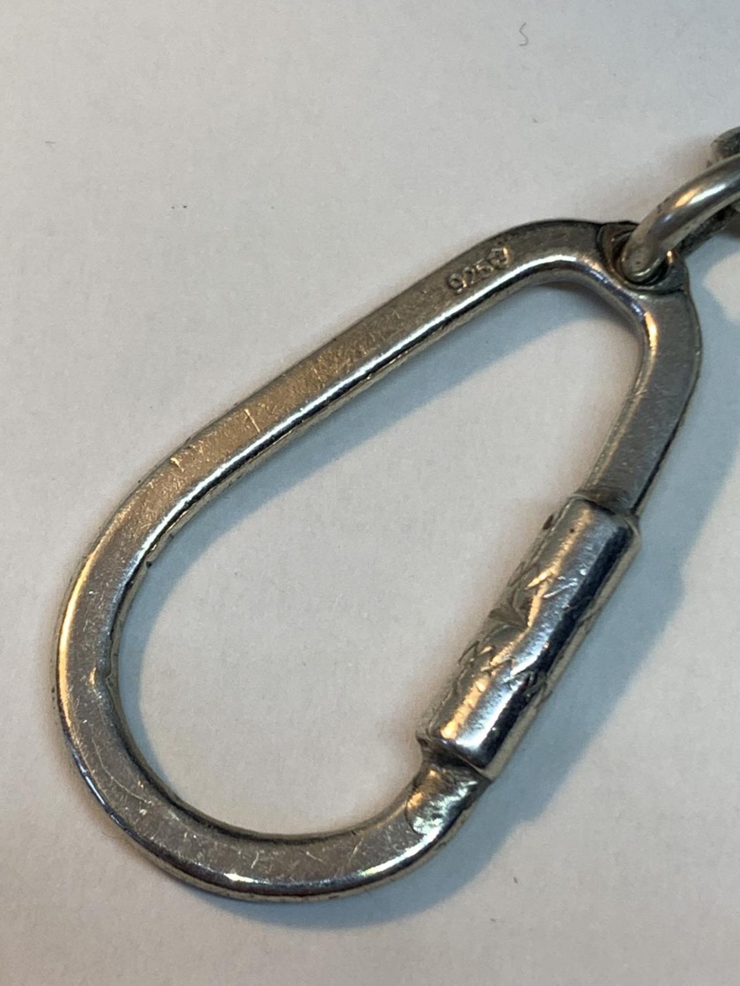 A SILVER KEYRING WITH THREE VINTAGE KEYS - Image 2 of 2