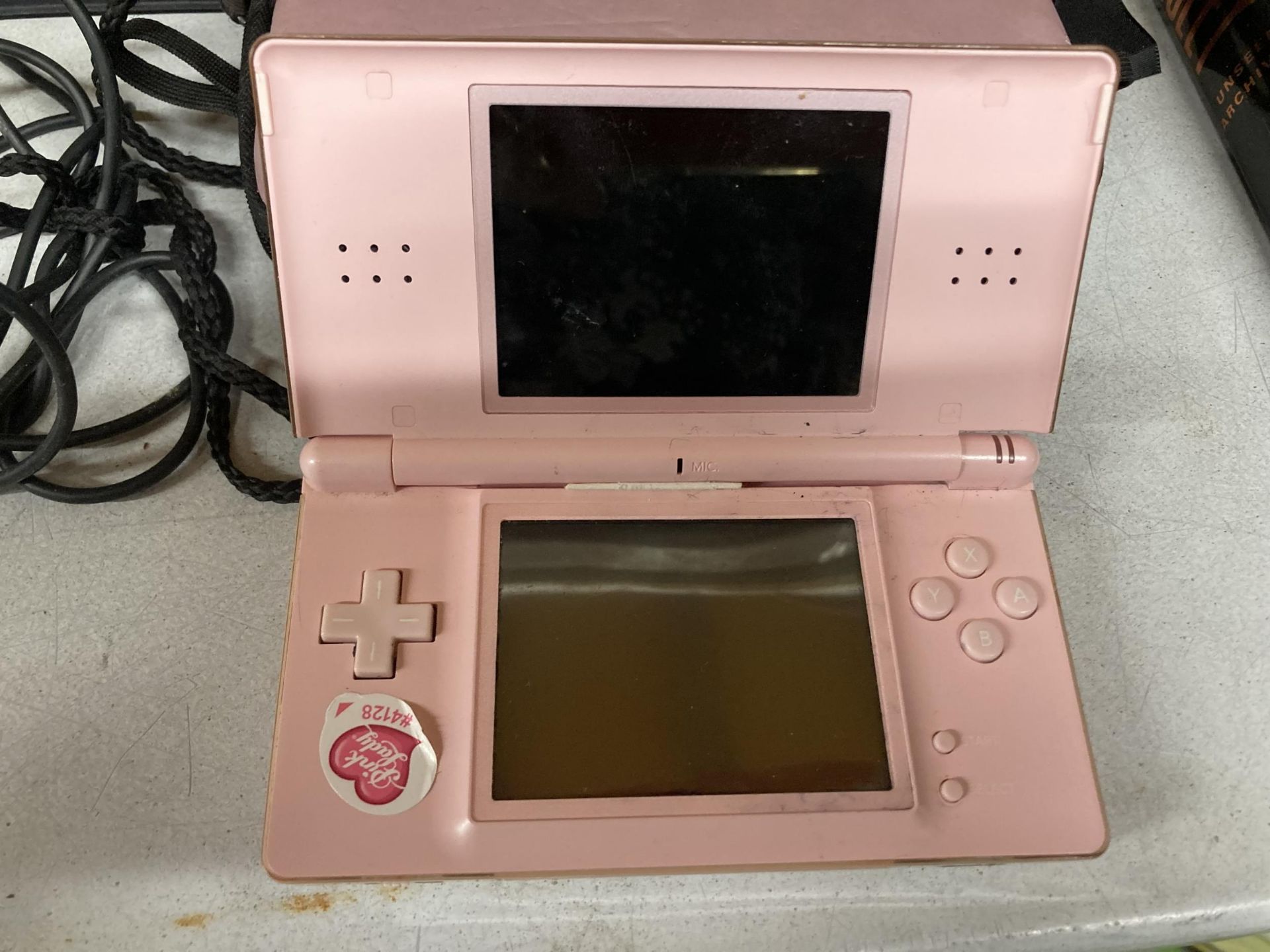 APINK NINTENDO DS LITE WITH CHARGER AND CASE, PHOTO ALBUM AND STATIONERY ITEMS - Image 3 of 3