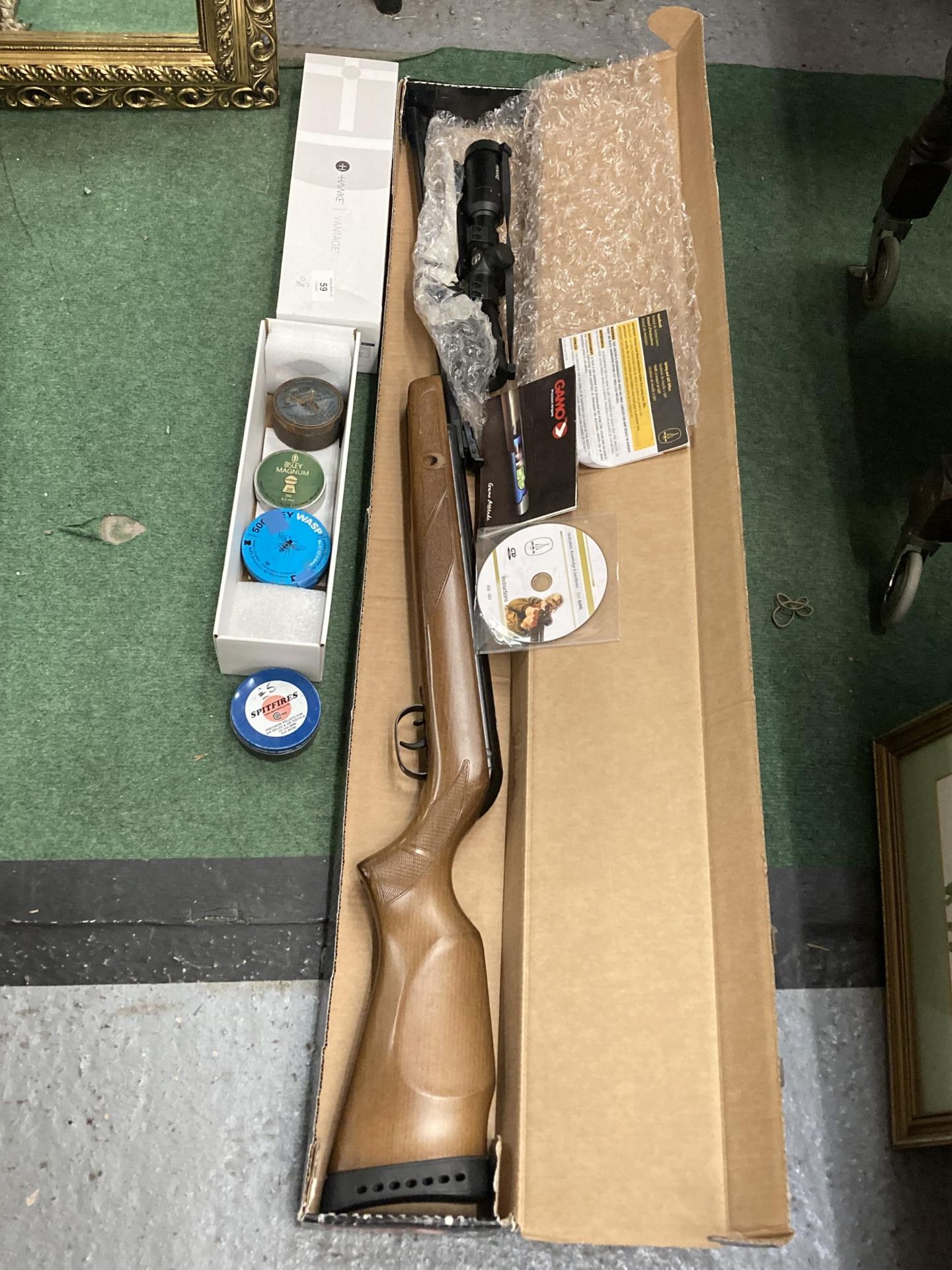 A BOXED GAMO .22 AIR RIFLE WITH HAWKE SCOPE ETC
