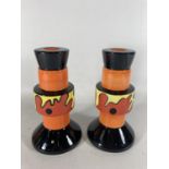 A PAIR OF HANDPAINTED AND SIGNED LORNA BAILEY CANDLESTICKS LAVA PATTERN