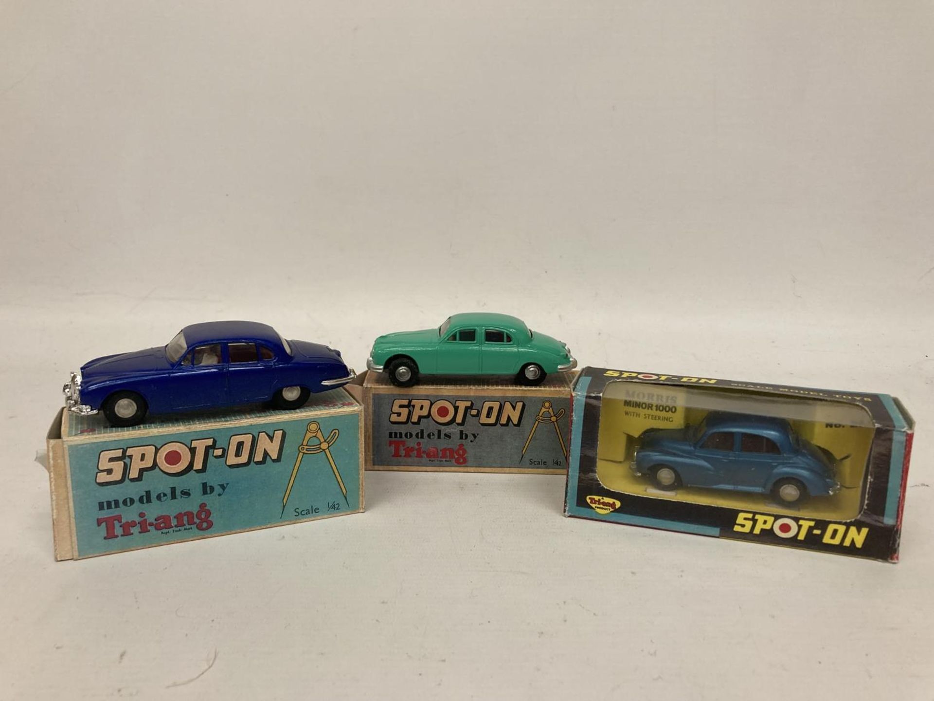 THREE SPOT-ON BOXED MODELS TO INCLUDE A MORRIS MINOR 1000 (NO 289), A JAGUAR S-TYPE (NO 276) AND A