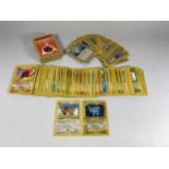 A LARGE COLLECTION OF 1999 WOTC POKEMON BASE SET, ROCKET, FOSSIL AND JUNGLE SET CARDS, 1ST EDITION