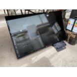 AN LG 42" TELEVISION WITH STAND AND REMOTE CONTROL