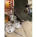 THREE STAINLESS STEEL COOKING PANS AND A JUICE PRESS