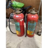 TWO VINTAGE CONQUEST FIRE EXTINGUISHERS