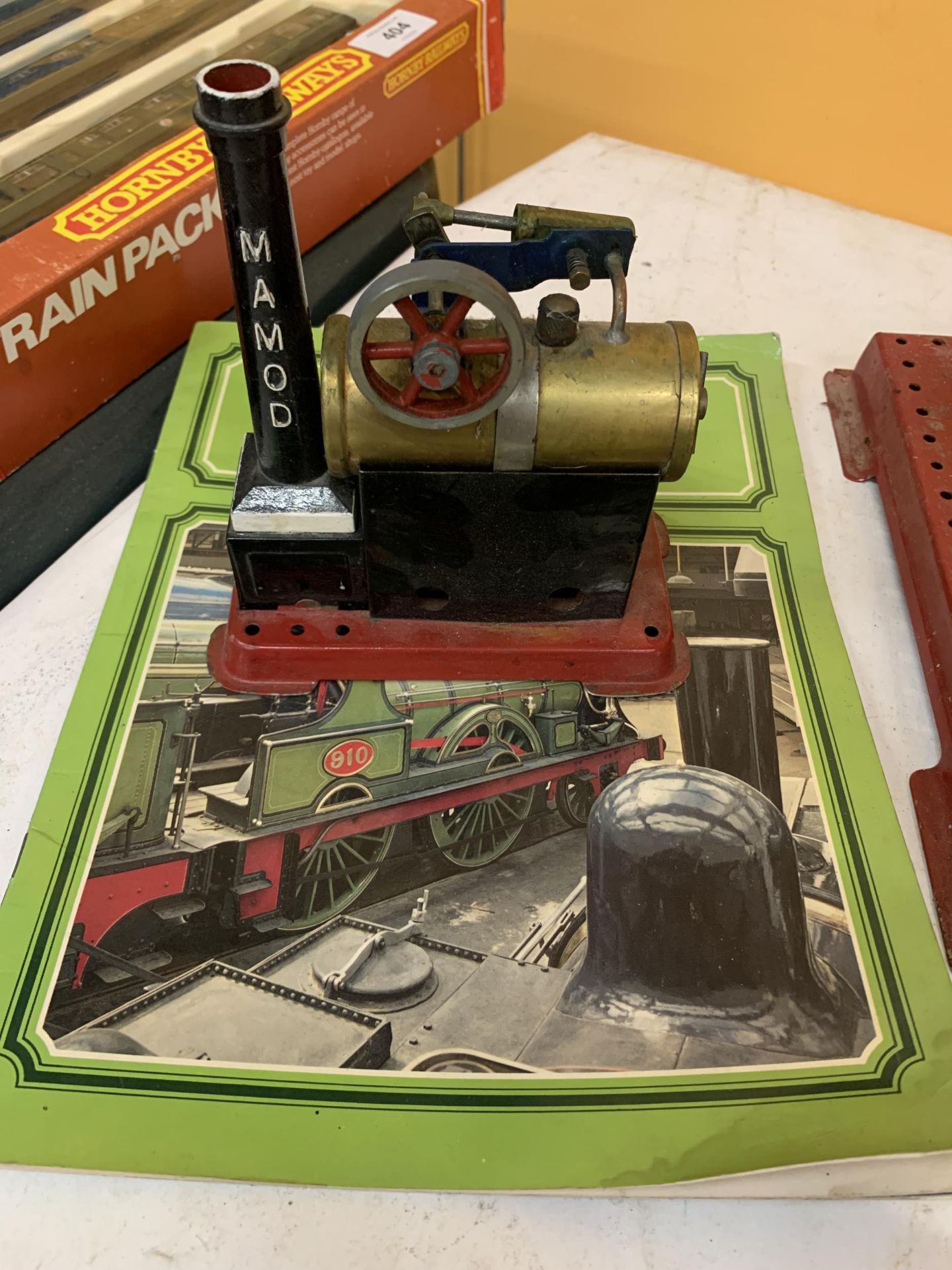A MINIATURE MAMOD STEAM ENGINE AND A NATIONAL RAILWAY MUSEUM BOOK