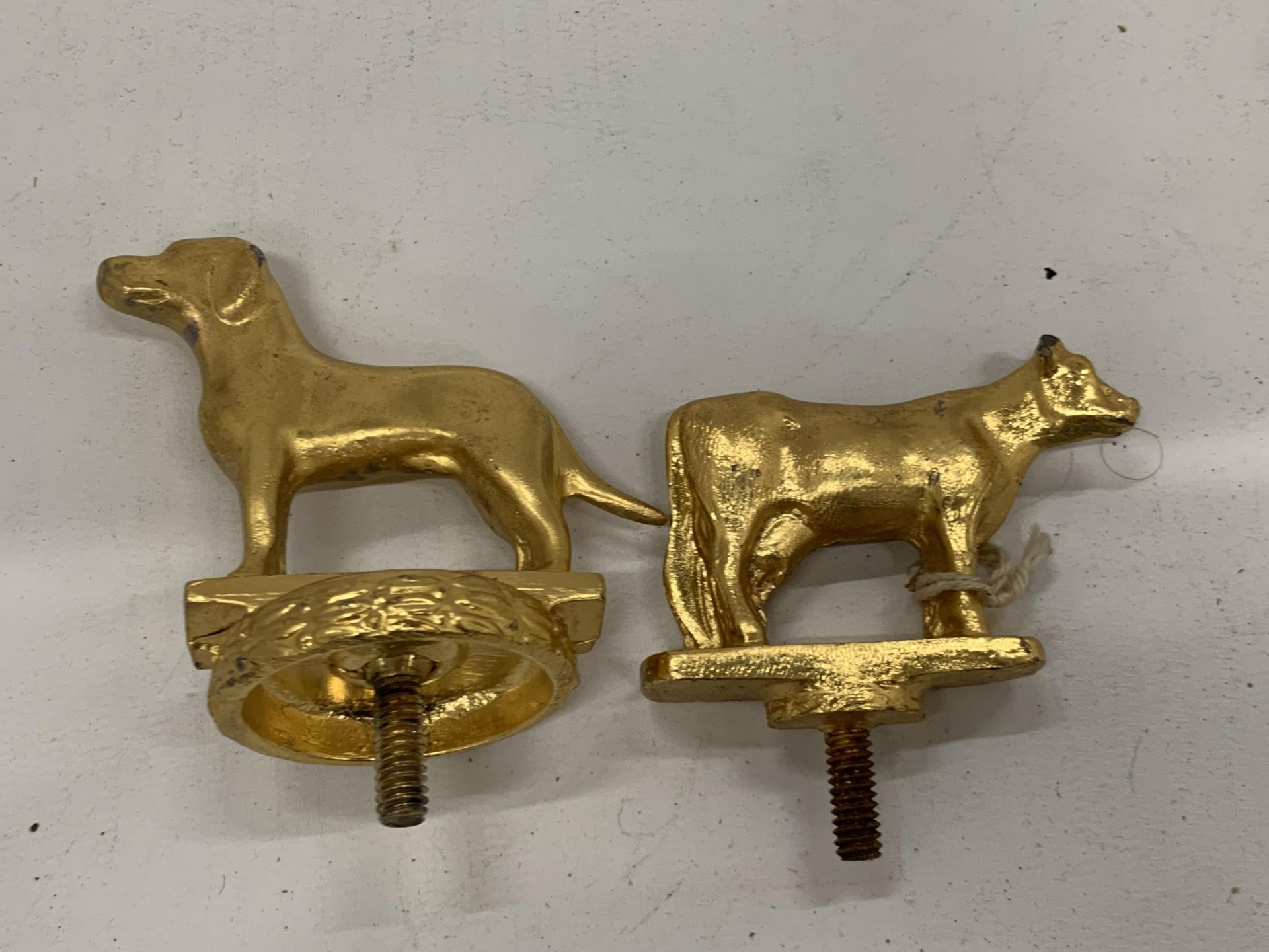 TWO VINTAGE GOLD PAINTED CAR MASCOTS - COW AND DOG
