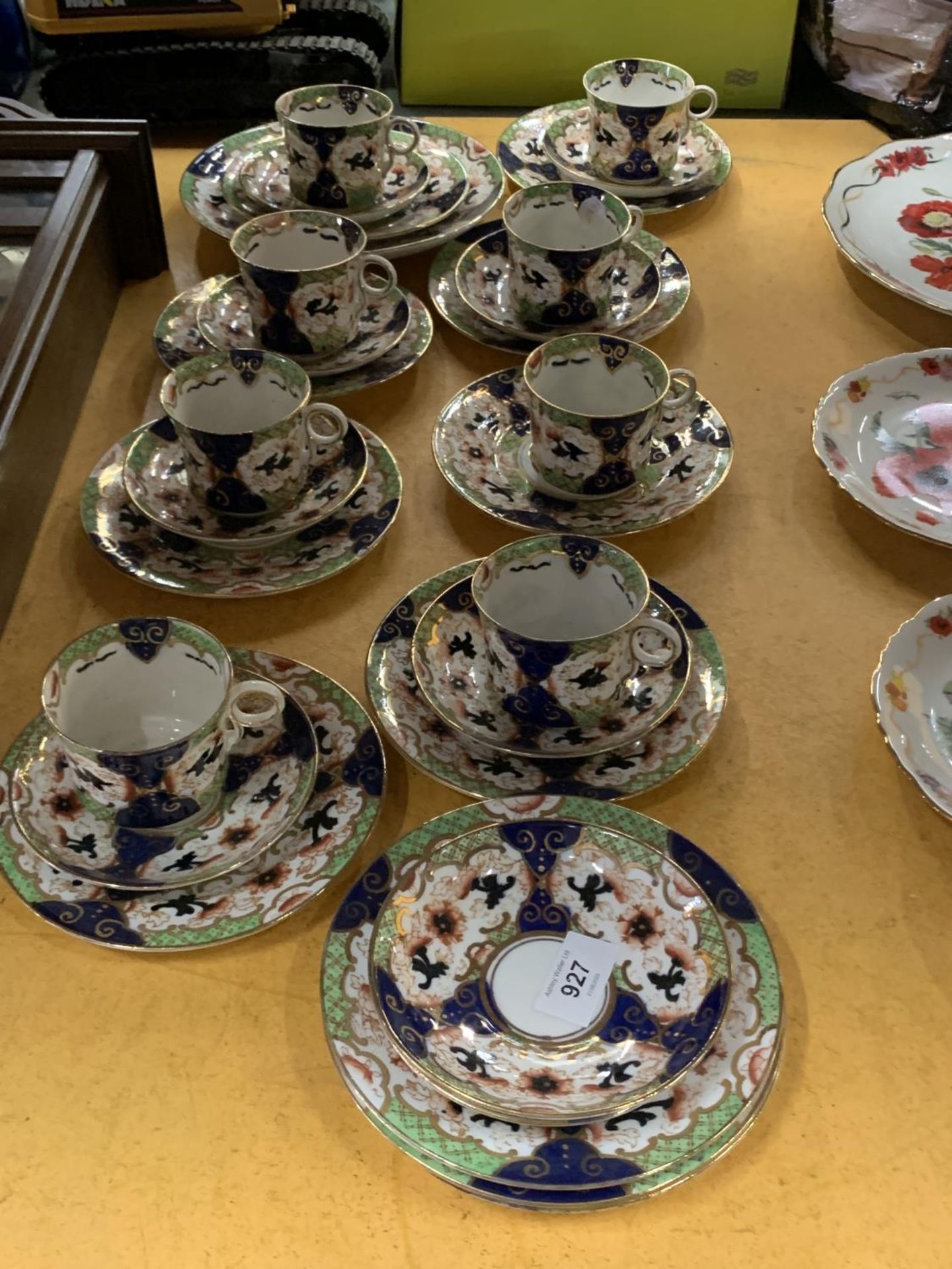 A COLLECTION OF VINTAGE ROYAL STAFFORD CUPS, SAUCERS AND SIDE PLATES