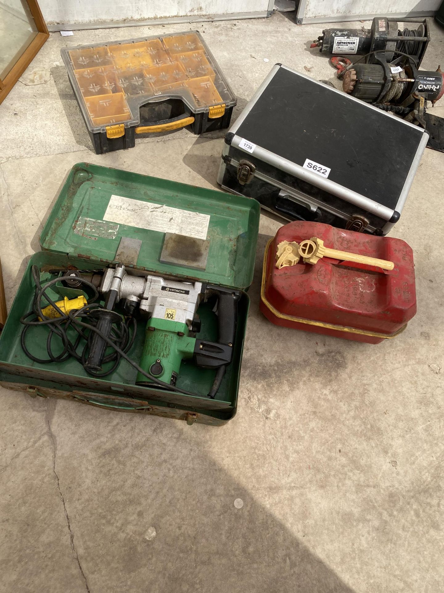 AN ASSORTMENT OF ITEMS TO INCLUDE AN HITACHI SDS DRILL AND A FUEL CAN ETC