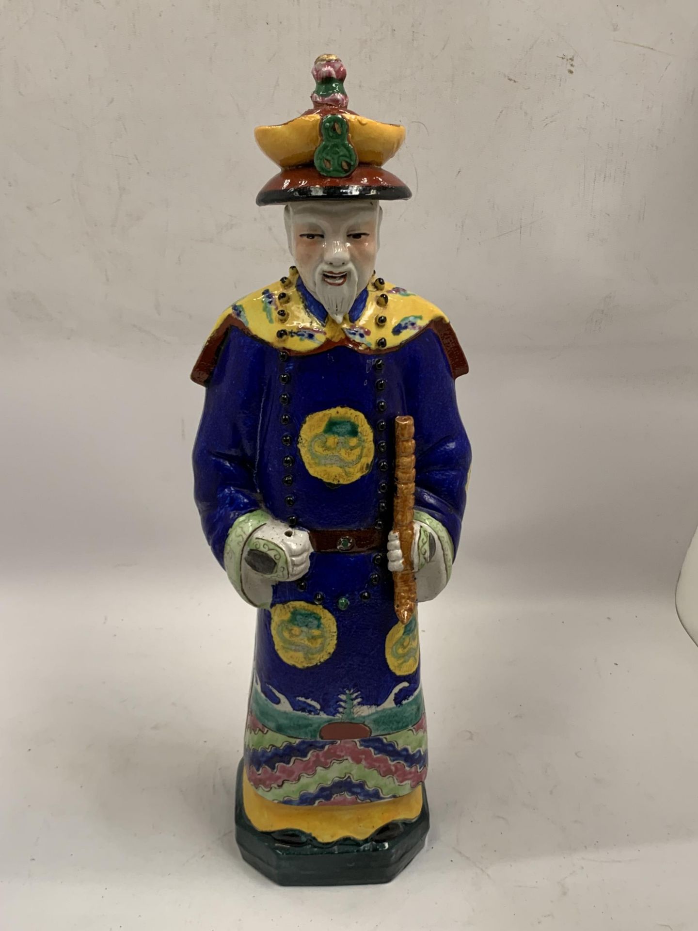 A LARGE ORIENTAL STONEWARE MODEL OF AN IMMORTAL, SIGNED TO BASE, HEIGHT 45CM
