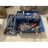 A TOOL BOX CONTAINING AN ASSORTMENT OF SOCKETS AND PLIERS ETC